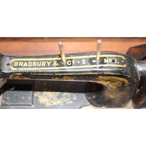 819 - Antique Bradbury & Co No. 1 crank handle sewing machine in wooden case