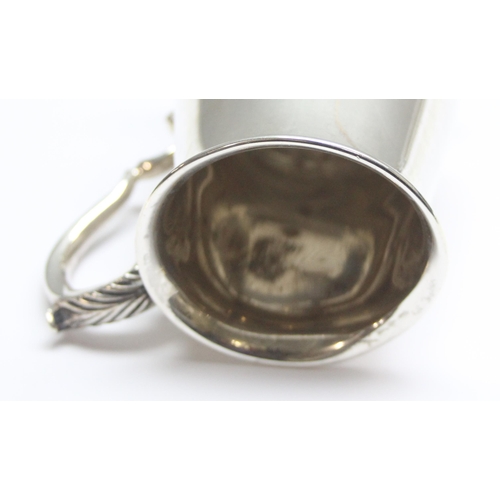 1029 - A heavy silver christening mug, Sheffield 1935 by Harrison Brothers & Howson (George Howson), approx... 