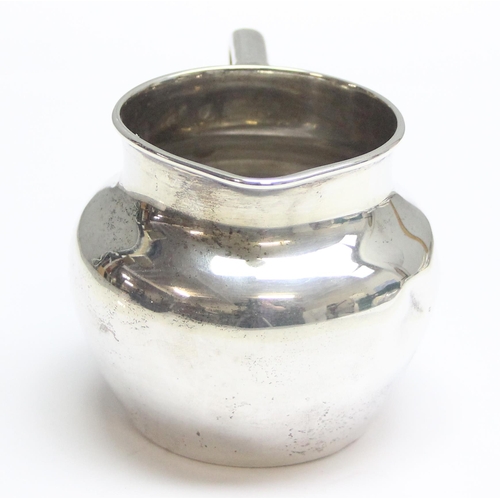 1030 - A small vintage silver cream jug, London mark with date letter and makers mark rubbed, approx 98.51g... 