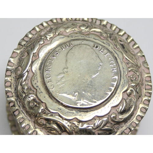 1034 - A Victorian embossed silver trinket box set with a George III 1787 silver shilling coin, marked for ... 