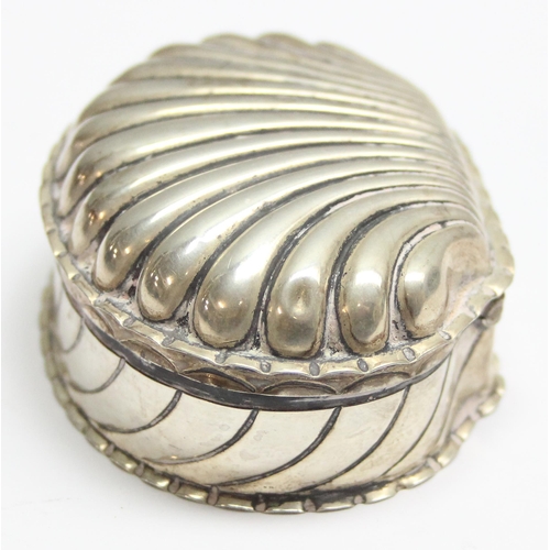 1035 - A Victorian embossed silver shell shaped trinket box, marked for Birmingham 1893 by Horton & Allday,... 