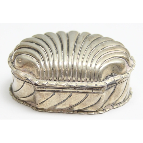 1035 - A Victorian embossed silver shell shaped trinket box, marked for Birmingham 1893 by Horton & Allday,... 