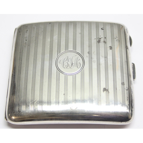 1037 - An early 20th century silver cigarette case with pin stripe decoration, marked for Birmingham 1921 b... 