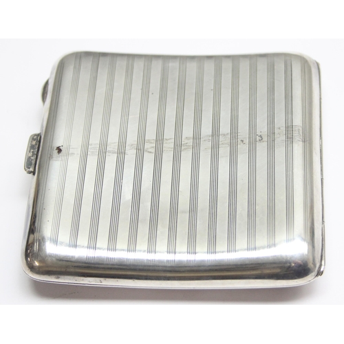 1037 - An early 20th century silver cigarette case with pin stripe decoration, marked for Birmingham 1921 b... 