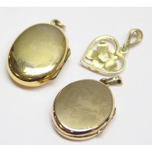 1149 - 2 9ct gold back and front lockets and a 10ct gold floral pendant, approx 7.94g gross