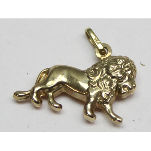 1154 - 9ct gold charm formed as lion, approx 0.67g gross