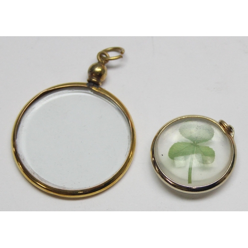 1156 - A 9ct gold mounted glass pendant and a similar gold plated pendant with Shamrock design (2)