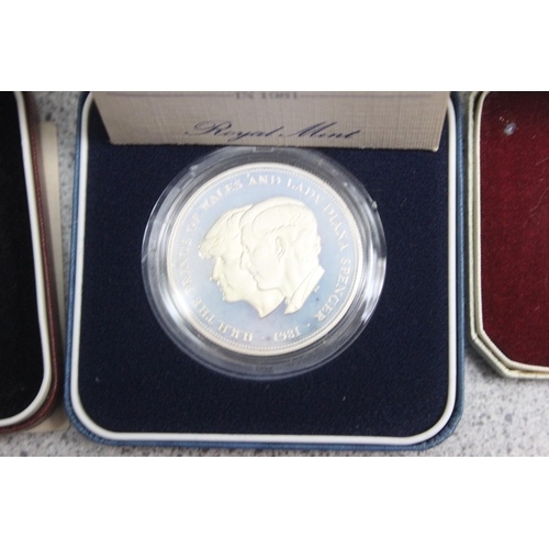 1286 - 4 boxed silver coins, 1963 Kennedy half dollar, 1973 St Helena Tercentenary of the Granting of the R... 