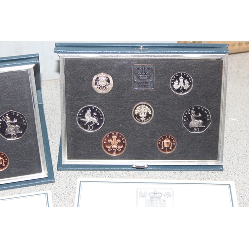 1288 - 4 Royal Mint proof coin collections in cases, 1983, 1984, 1986 & 1987