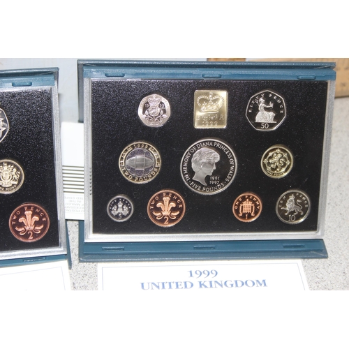 1290 - 4 Royal Mint proof coin collections in cases, 1996, 1997, 1998 & 1999