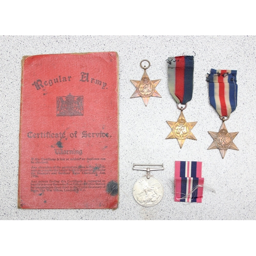 1433 - 4 assorted WW2 medals and a Regular Army certificate of service book