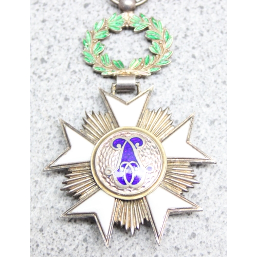 1435 - Belgian Order of the Crown medal in silver gilt and a USA National Defence medal (2)