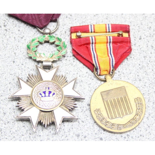 1435 - Belgian Order of the Crown medal in silver gilt and a USA National Defence medal (2)