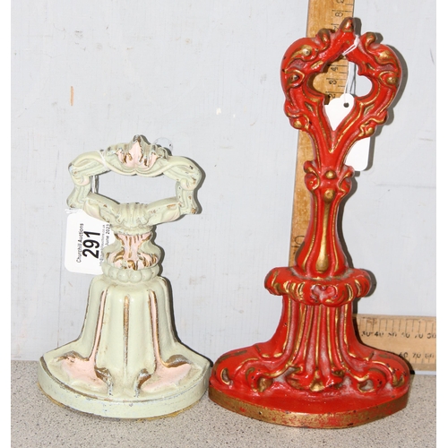 291 - 2 antique style door stops, red and cream painted with gilt highlight, one marked Kenrick 466