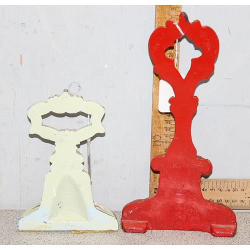 291 - 2 antique style door stops, red and cream painted with gilt highlight, one marked Kenrick 466