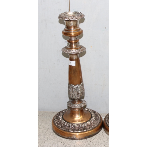 1004 - Pair of copper candlesticks with silver plated decoration