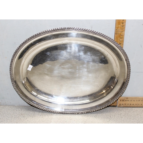 1005 - Qty of metalware to include silver plated tray, candlesticks and photo frames