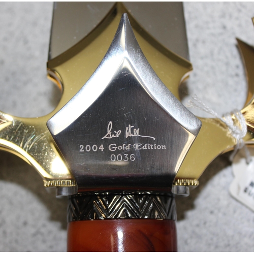 1405 - Hibben fantasy centurion dagger, No. 36 of limited gold edition contained in original box with maker... 