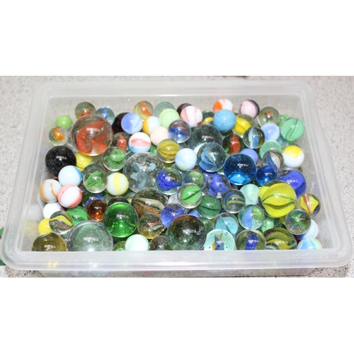 1500 - Qty of glass marbles and a vintage monopoly set (unboxed)