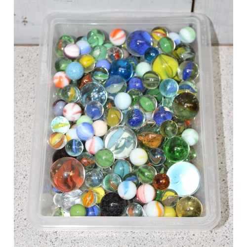 1500 - Qty of glass marbles and a vintage monopoly set (unboxed)