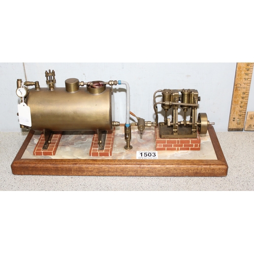 1503 - A well engineered model of a twin oscillating vertical steam engine, linked to a brass horizontal cr... 