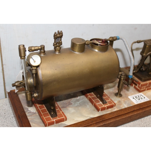 1503 - A well engineered model of a twin oscillating vertical steam engine, linked to a brass horizontal cr... 