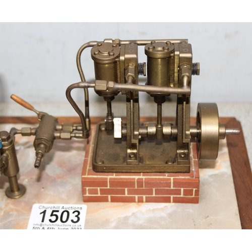 1503 - A well engineered model of a twin oscillating vertical steam engine, linked to a brass horizontal cr... 