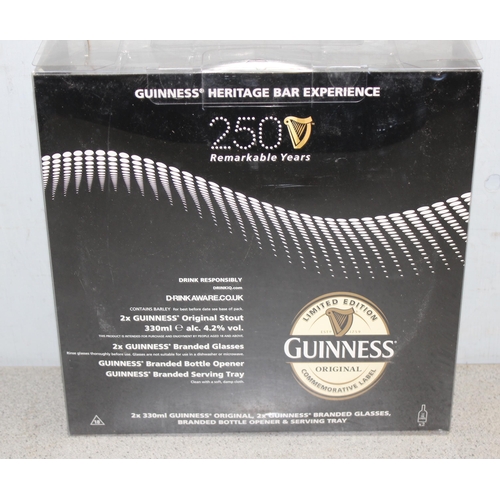 1615 - Limited edition Guinness gift pack to include 2 bottles of Guinness, branded glasses and serving tra... 