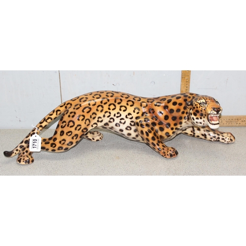 1710 - Large pottery figure of a Leopard seemingly unmarked, measures approx 75cm from tail to paw