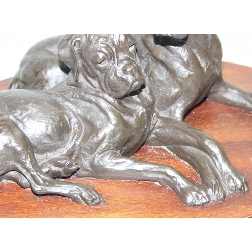 1722 - Doris Lindner (XX), bronzed sculpture of 2 recumbent dogs on wooden base