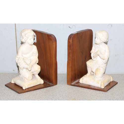 273 - Pair of Bookends with young Athenian children mounted