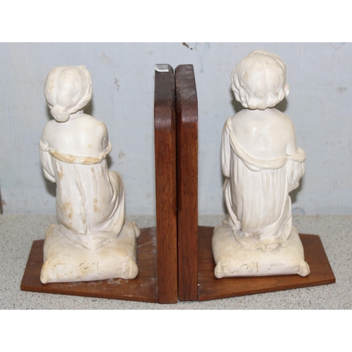 273 - Pair of Bookends with young Athenian children mounted