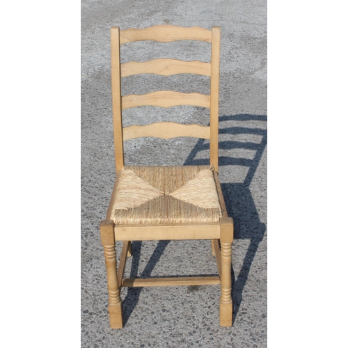 150 - 4 pine ladderback kitchen chairs with rush seats