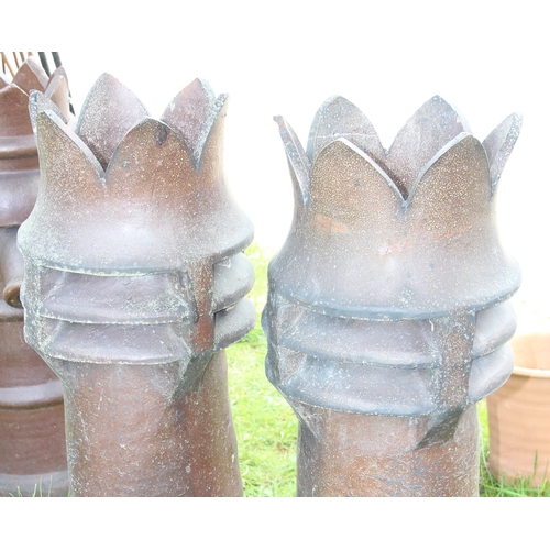 324 - Pair of impressive chimney tops with crown tops, each approx 102cm tall