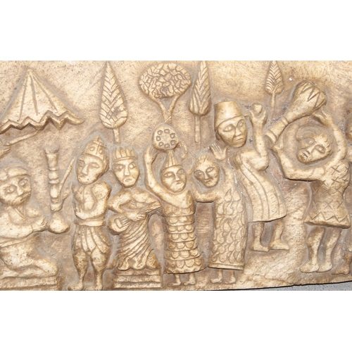 1649 - A large Ethiopian carved marble plaque depicting a procession, likely 20th century, approx 60cm wide