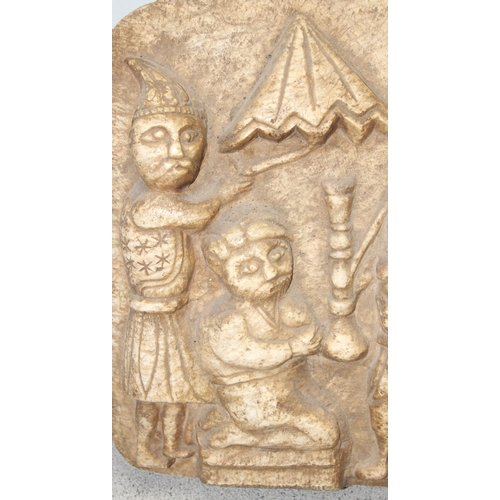 1649 - A large Ethiopian carved marble plaque depicting a procession, likely 20th century, approx 60cm wide