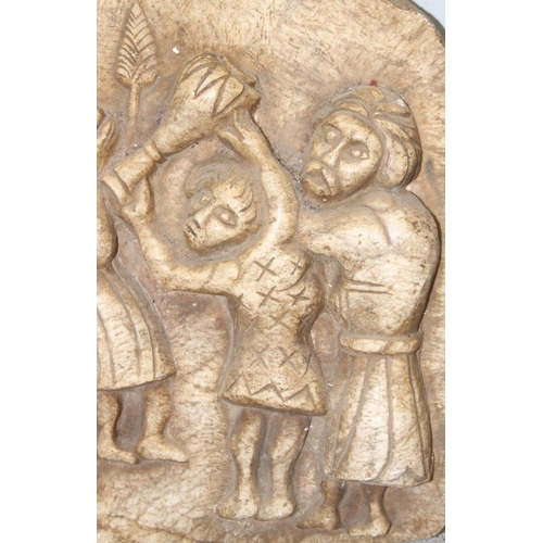 1649 - A large Ethiopian carved marble plaque depicting a procession, likely 20th century, approx 60cm wide