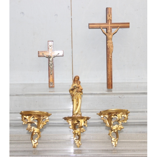 1797 - A pair of small Italian carved giltwood wall brackets, a similar bracket with a Madonna and Child an... 