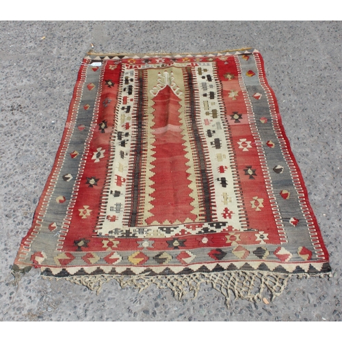 213 - A vintage red ground flatweave Kilim prayer rug, approx 160cm x 100cm