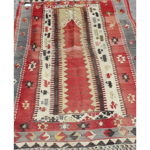 213 - A vintage red ground flatweave Kilim prayer rug, approx 160cm x 100cm