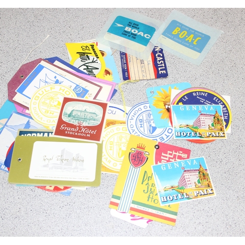 546 - A large qty of assorted vintage luggage labels and airline flight labels etc