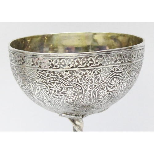 1001 - A 19th century Anglo-Indian silver double drinking vessel or measurer, decorated with intricate deta... 