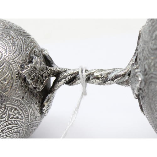 1001 - A 19th century Anglo-Indian silver double drinking vessel or measurer, decorated with intricate deta... 