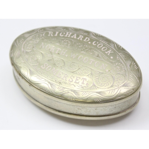 1056 - A silver plated and embossed vesta case and a silver plated Thomas Evans of Treherbert snuff box nam... 