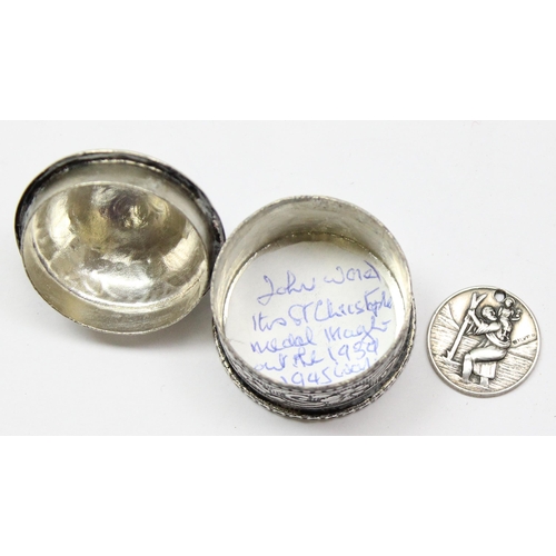 1062 - A small 800 silver trinket box containing a silver St Christopher medallion and note saying it was w... 