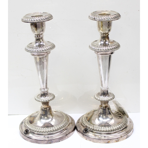 1077 - A pair of early 20th century Elkington silver plated candlesticks, marked for 1935, later profession... 