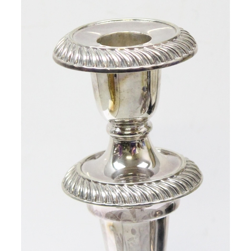 1077 - A pair of early 20th century Elkington silver plated candlesticks, marked for 1935, later profession... 