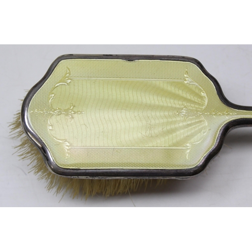 1078 - A silver and yellow guilloche enamel backed brush, Birmingham 1932 & a silver backed hand mirror, Bi... 