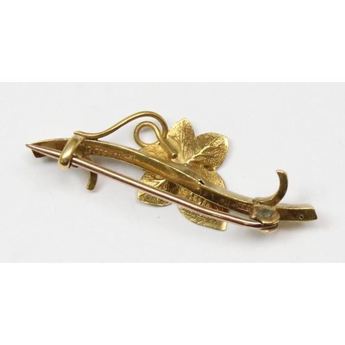 1143 - A 15ct gold brooch formed as a leaf set with seed pearl, approx 2.32g gross