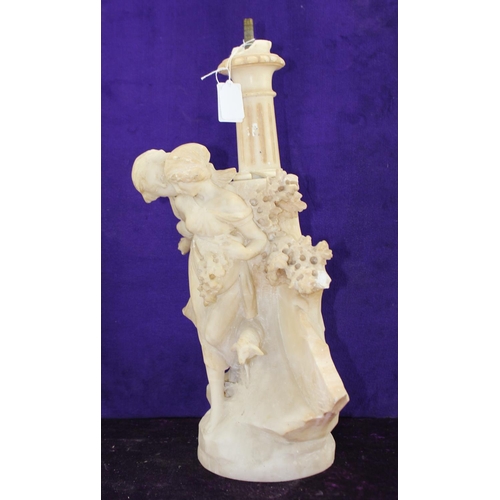 1638B - A large carved marble lamp base depicting a loving couple with sheep, signed A Frilli of Florence, l... 